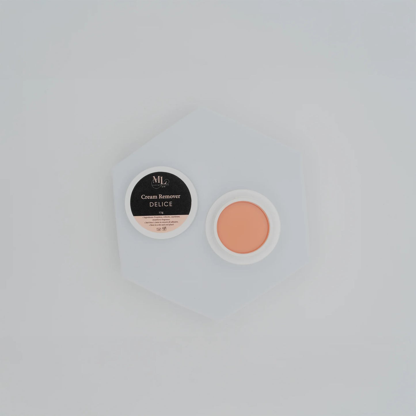 Open container of Delice eyelash extension cream remover (15g) in flatlay style.