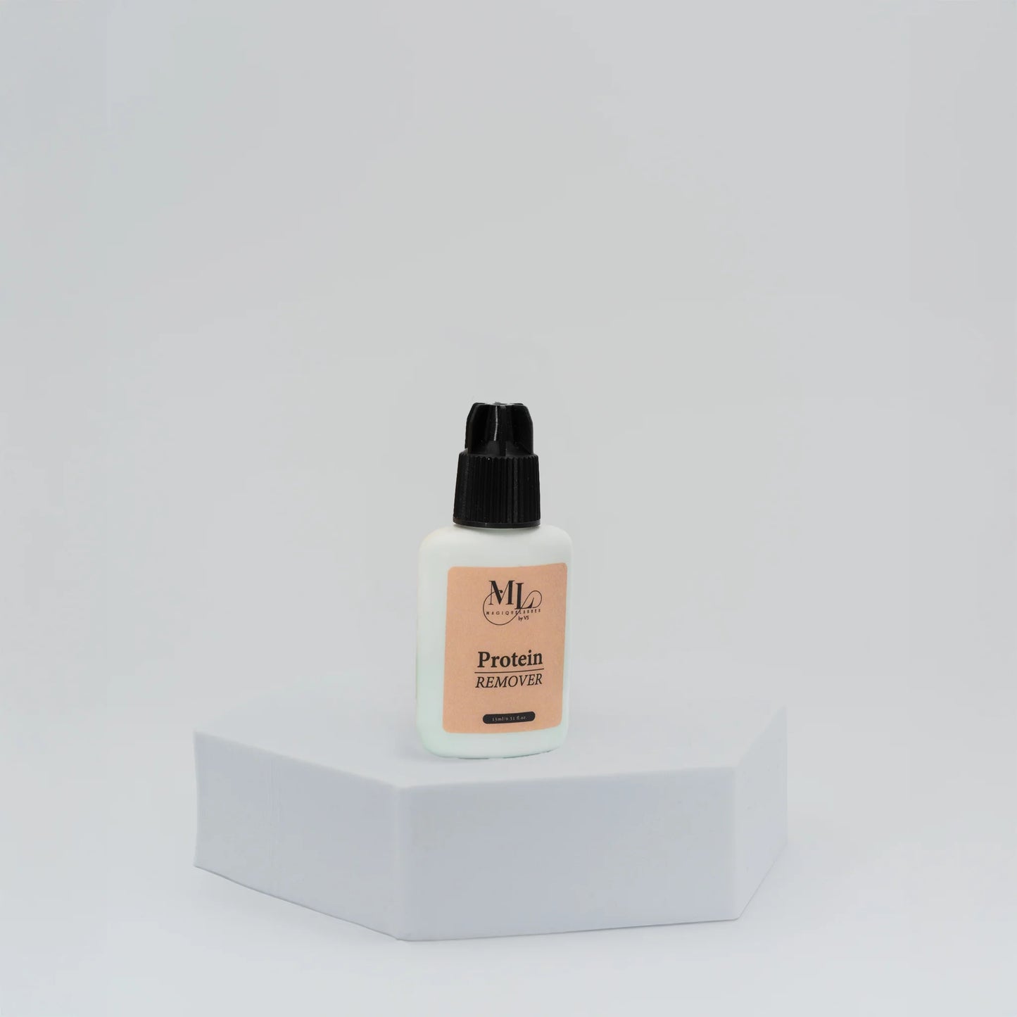Pre-treatment protein remover for eyelash extensions, displayed on white hexagon base, cleanses natural lashes for better retention, The Lash Box Shop.