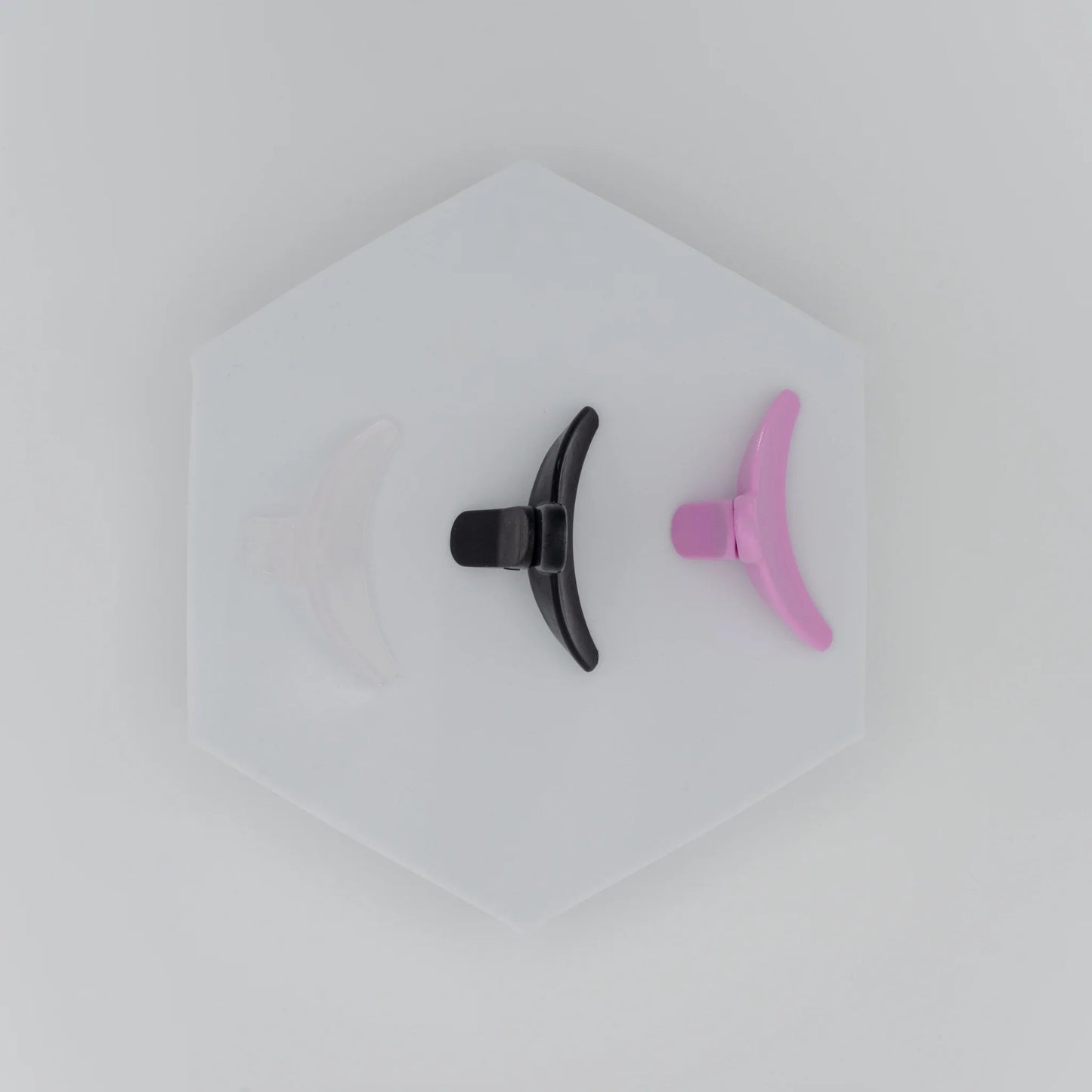 Reverse Lash Lift Shields in clear, black, and purple colours displayed flat on a white background.