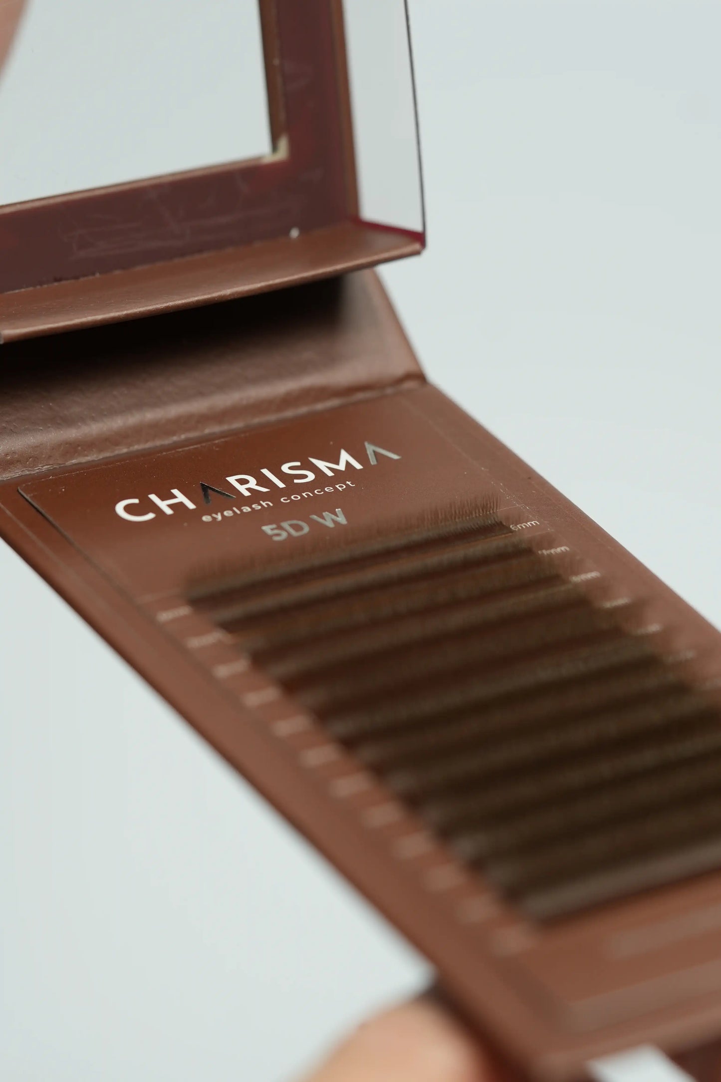 close-up of CHARISMA 4DW brown premade lash fans tray showing dense soft volume narrow base eyelash extensions
