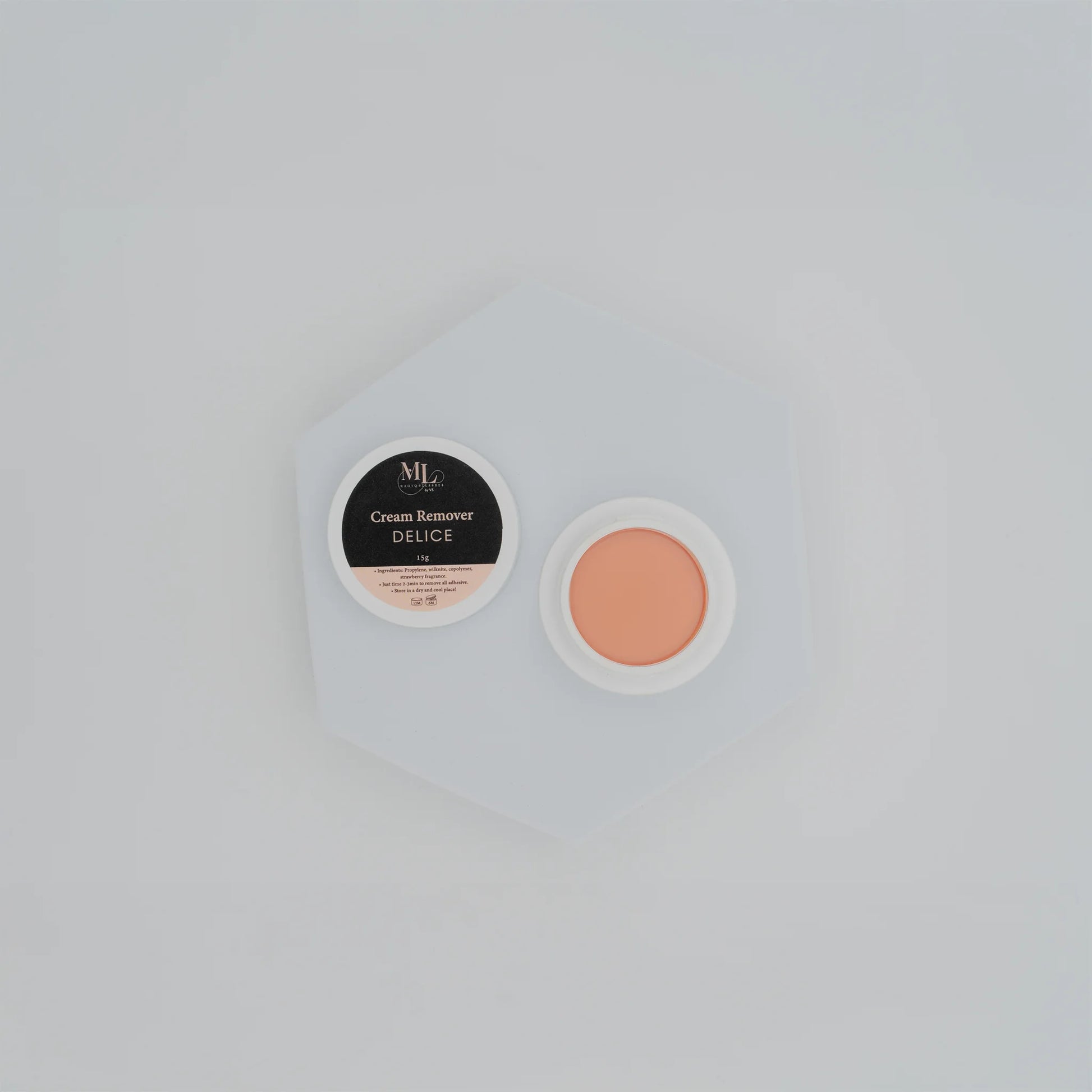 Open container of Delice eyelash extension cream remover (15g) in flatlay style.
