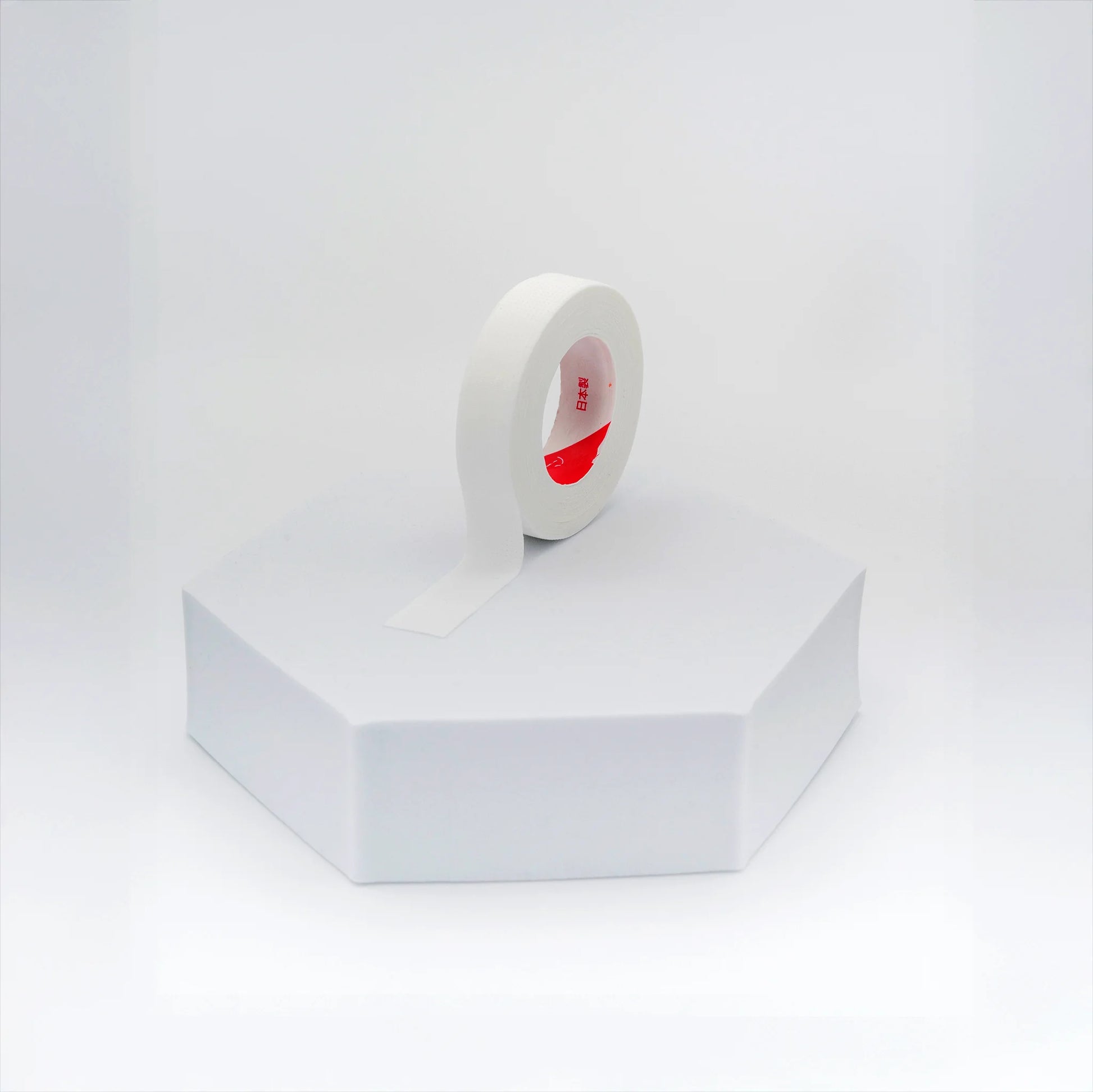 Japanese breathable tape for eyelash extensions, flexible and soft adhesive ideal for securing eyepatches and isolating lashes during treatments, The Lash Box Shop.
