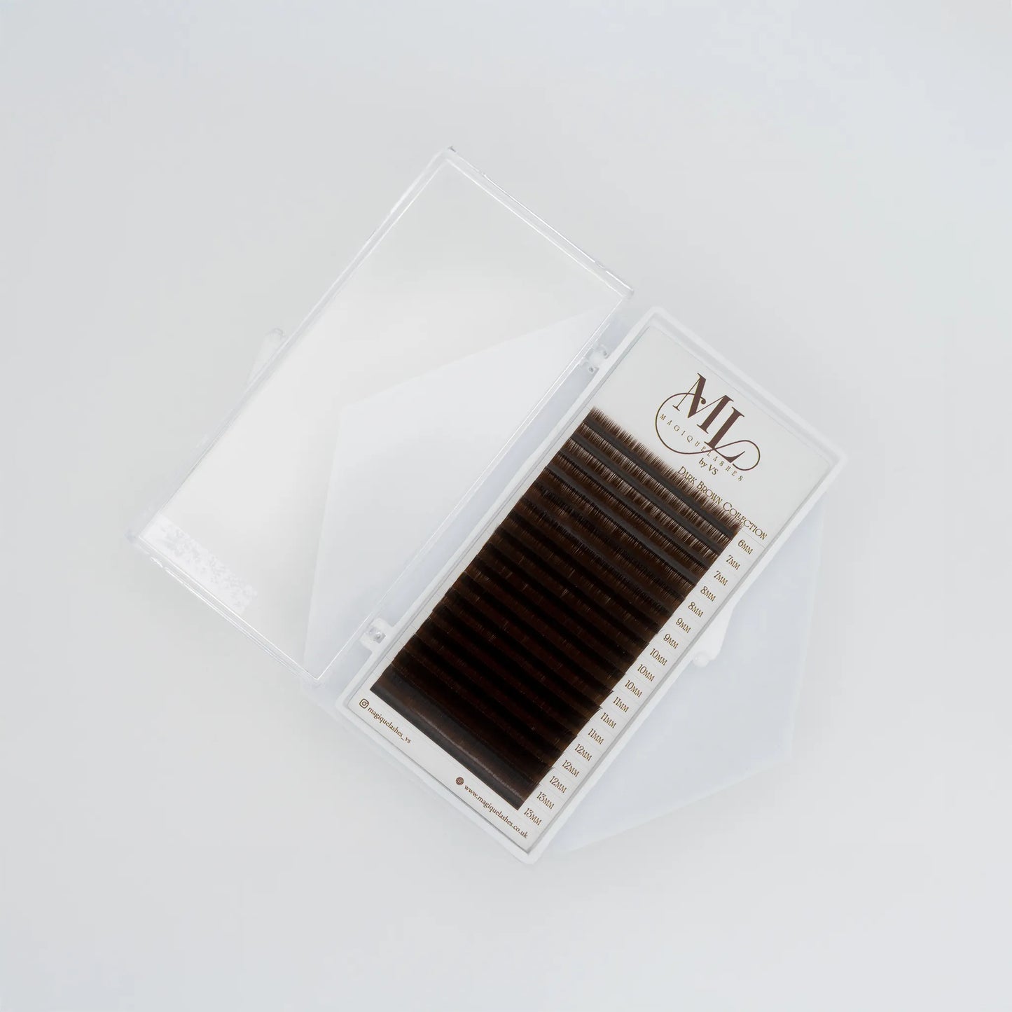 Top view of MAGIQUE Coffee brown eyelash extensions tray showing lash strip lengths and soft mid-brown fibres.