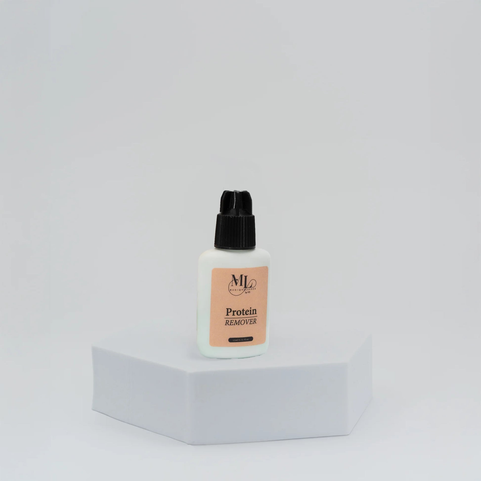 Pre-treatment protein remover for eyelash extensions, displayed on white hexagon base, cleanses natural lashes for better retention, The Lash Box Shop.