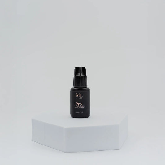 Pro Lash Adhesive for eyelash extensions, standing bottle display, ultra-fast drying lash glue for classic, volume, and hybrid lash application, The Lash Box Shop.