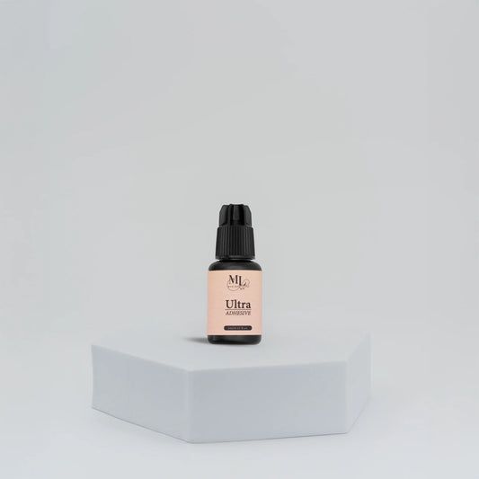 Ultra Lash Adhesive for eyelash extensions, standing bottle display, perfect for precise application, fast 1–2 second drying time, The Lash Box Shop.
